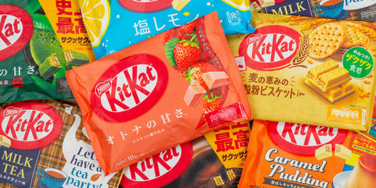 Colorful assortment of unique Kit Kat flavors including matcha, strawberry, and caramel pudding, showcasing vibrant packaging.