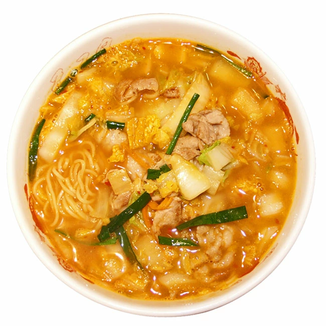 Bowl of Tenri Stamina Ramen with spicy soy sauce broth, featuring straight thin noodles and assorted vegetables.