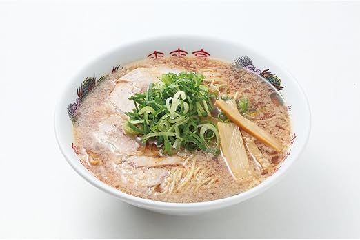ISLAND FOODS Shiga Ramen in bowl, showcasing spicy soy sauce broth, pork fat, green onions, and bamboo shoots, famous Rairaitei flavor