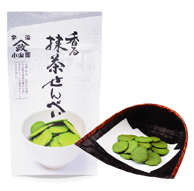 Packaging and bowl of Matcha Rice Cracker 60g, showcasing green matcha-flavored bite-size snacks. Contains wheat, egg, dairy.