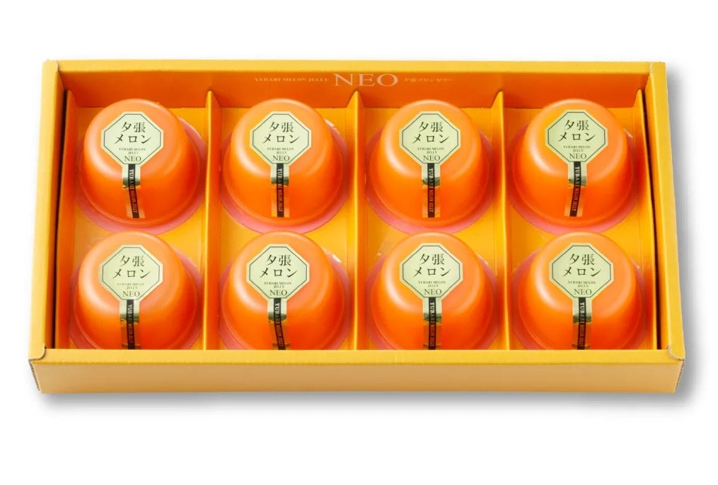 Yubari Melon Jelly Set with eight jellies in an orange box, showcasing luxurious Japanese dessert made from premium Yubari melon juice.