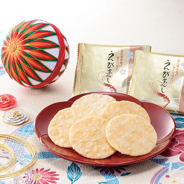 Ebi-koishi Shrimp Rice Crackers on a plate, featuring 18 pcs with northern pink prawn, packaging visible. Contains wheat, shrimp, soybean.
