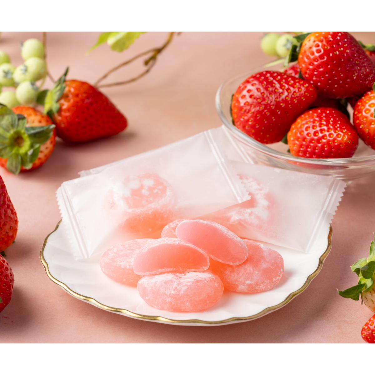 Strawberry mochi, soft chewy Japanese rice cake candy with sweet strawberry flavor and powdered sugar coating