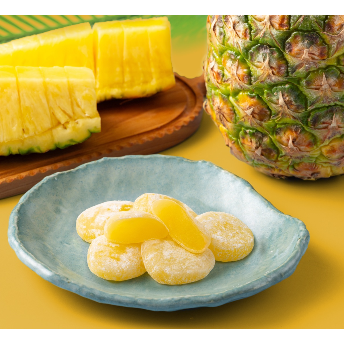 Pineapple mochi, soft chewy Japanese rice cake candy with sweet pineapple flavor and powdered sugar coating